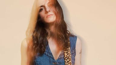 LAURA COX